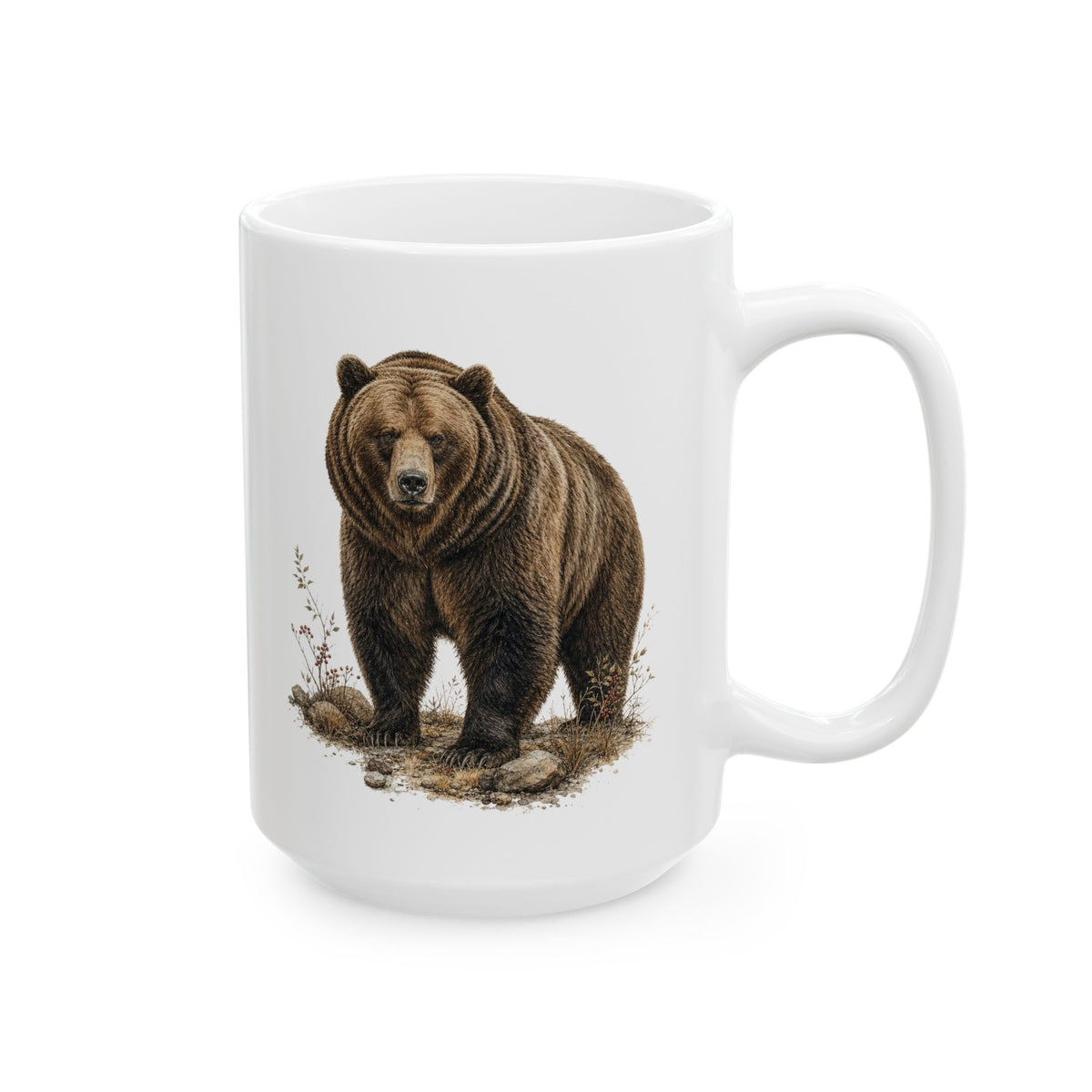 Rustic ceramic coffee mug with a detailed brown bear portrait surrounded by grasses and small woodland plants in warm brown and neutral tones, creating a vintage wildlife look inspired by mountain cabins and wilderness decor.